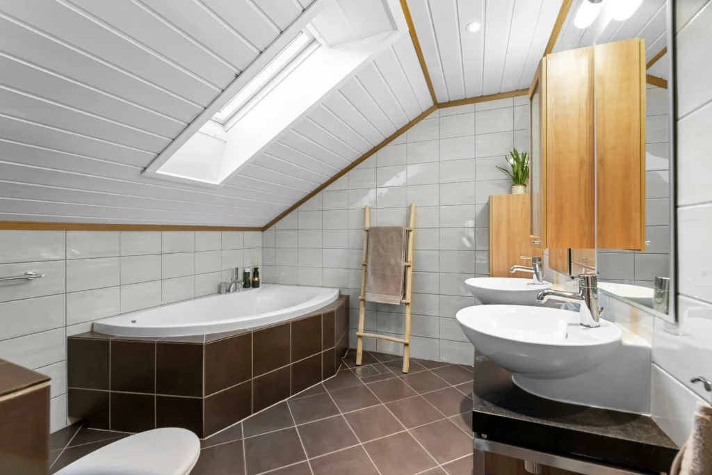 Stylish focal point feature in budget bathrooms designed by Bathroom Renovations Wellington.