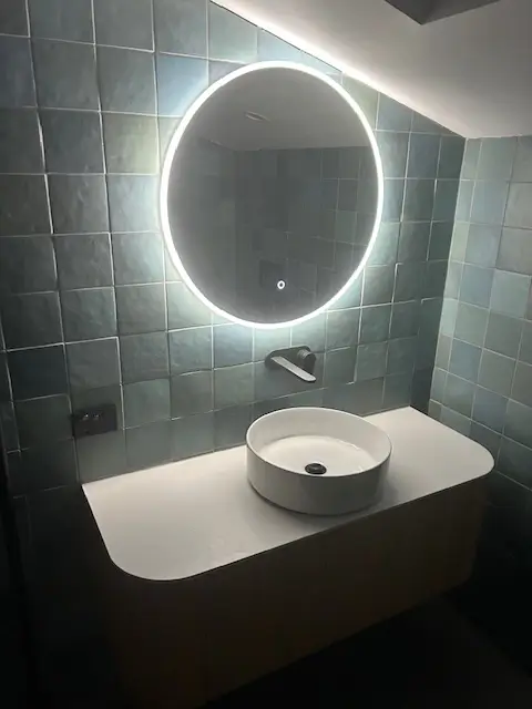 Stylish example of contemporary bathrooms by Bathroom Renovations Wellington featuring a sleek modern twist.